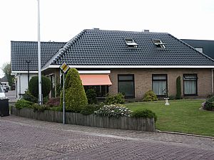 Nieuwe opbouw winkel en woonhuis Bathmen